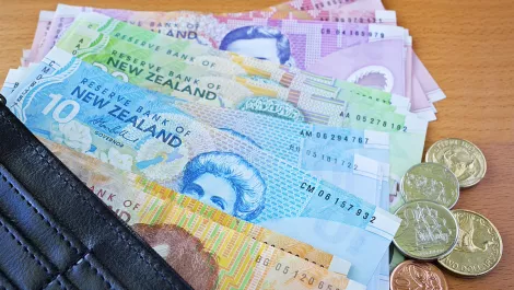 NZ dollar heads for 0.3% weekly gain as RBNZ's Wheeler disappoints pessimists